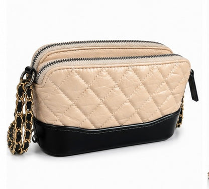 Chanel Gabrielle handbag in black and brown, pre-owned and in very good condition