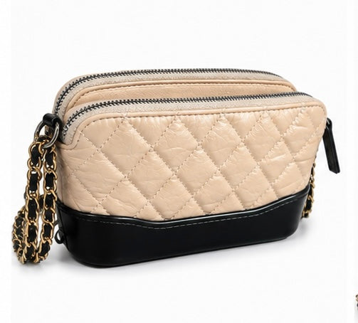 Chanel Gabrielle handbag in black and brown, pre-owned and in very good condition